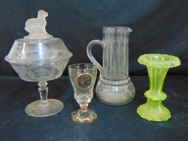 4 pieces of glass, covered compote with dog finial and etched hunt scenes; etched glass pitcher,
