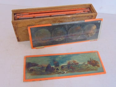 Lot of Magic Lantern slides in original wood case with sliding lid, 10 glass slides, including