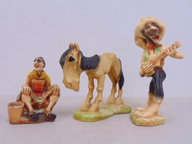 3 pieces of chalkware, donkey, man with string instrument, woman with pot, man is 11" tall, donkey
