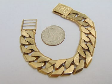 Jewelry. 14kt Gold link bracelet monogrammed AHG, 53.70 grams, approx. 7 1/4" length, bush gold,