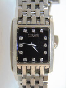 Jewelry. Wittnauer stainless wristwatch w/ diamond or Sapphire crystals? estate found no statement