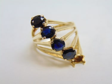 Jewelry. Vintage 14kt gold fan design ring w/ 4 blue gemstones one missing, 6.48 grams, size 7 1/2,