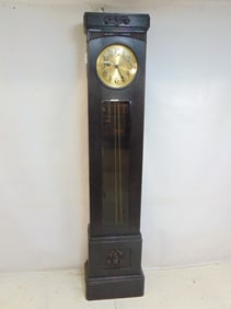 Oak tall clock, brass face, cabinet is locked, glass door, carved detail, 1930s, clock is 84" tall,