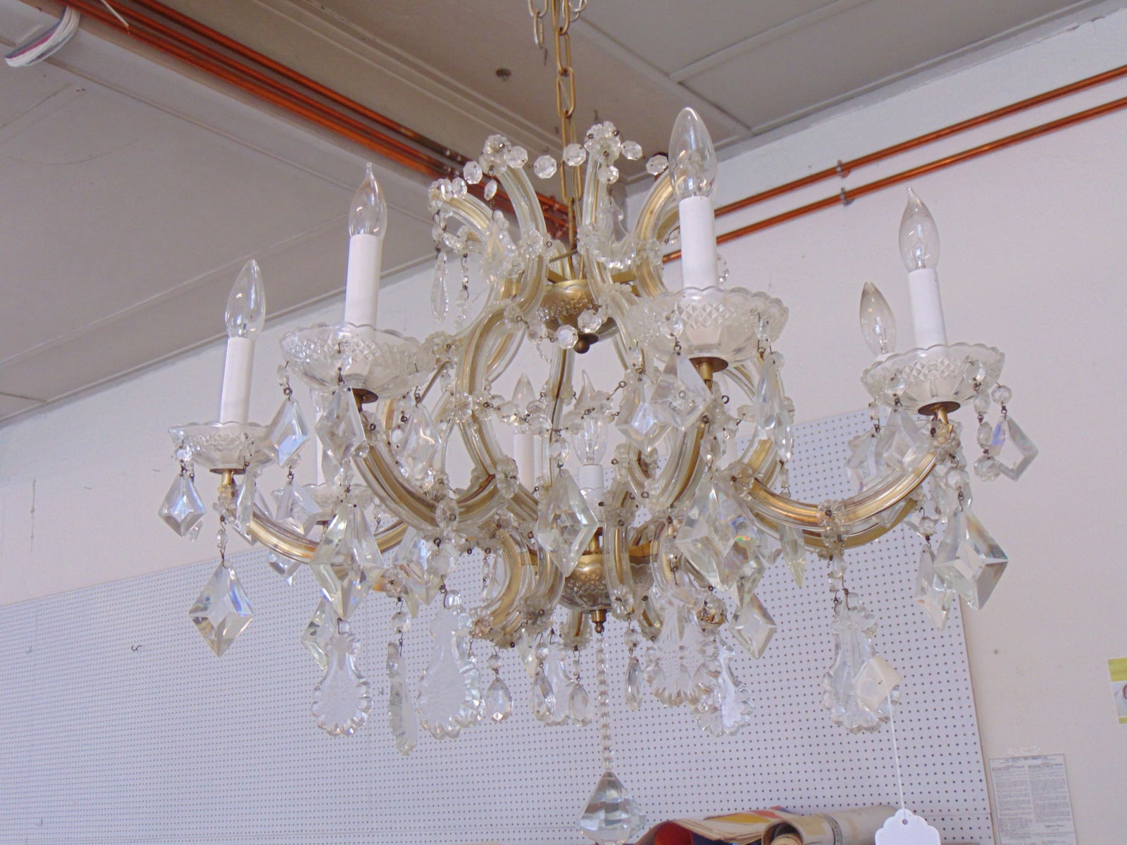 Chrystal chandelier, glass covered arms, hanging crystals, 8 arms, chandelier is 27.5" in diameter,: Chrystal chandelier, glass covered arms, hanging crystals, 8 arms, chandelier is 27.5" in diameter, height is 23"
