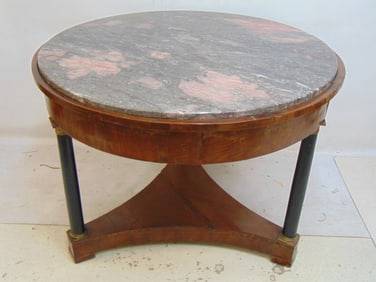 Round Biedermeier table with marble top, on black columns with bronze collars, table is 40.5" in di