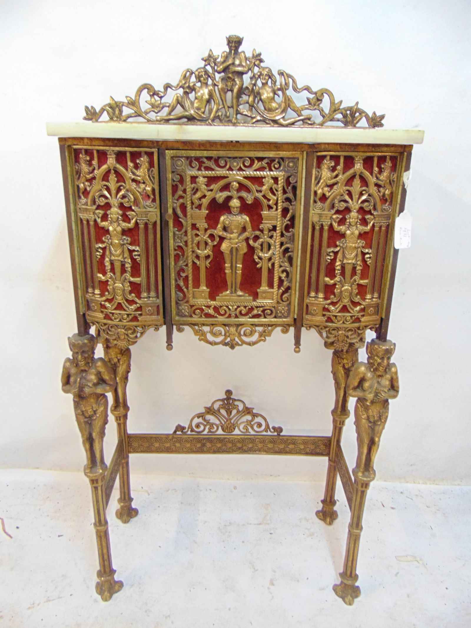 Bronze & iron onyx top cabinet by Oscar Boch, decorated with pan figure & nudes, with pan figures in (1 of 10)