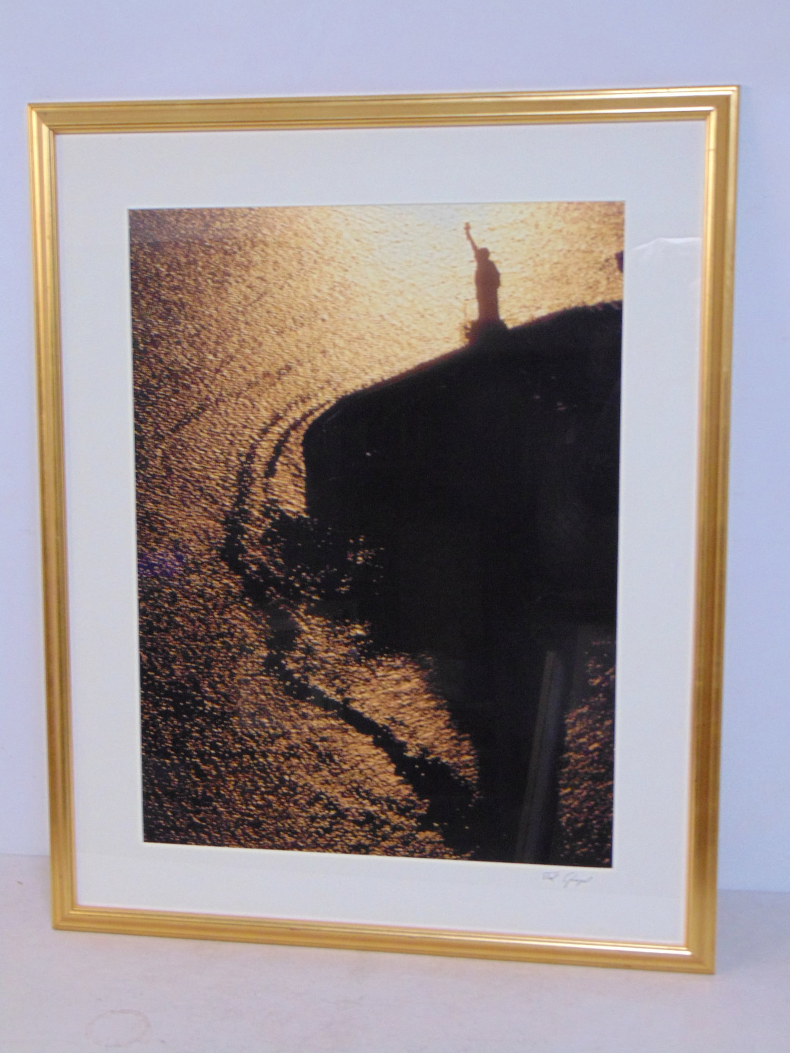Large framed photograph, Statue of Liberty, signed Ted Spiegel, Spiegel was a photographer for Natio: Large framed photograph, Statue of Liberty, signed Ted Spiegel, Spiegel was a photographer for National Geographic, 33.75" by 27.25", gilt framed