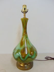 Ceramic Mid Century lamp base, green glaze with brown highlights, height is 21.25", diameter is 9"