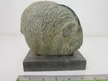 Stone carving, Ram, by Mark Morrison, green stone longhorn ram with wooly body, horns are polished,