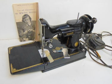 Singer featherweight sewing machine, no case, buzzes when plugged in, but belt does not move