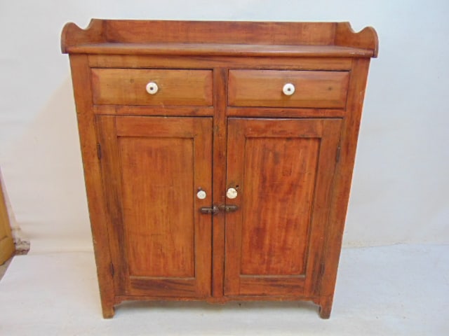 Country cupboard, 2 drawers over two doors, with backsplash, in red finish, paint, cabinet is 41" by (1 of 3)