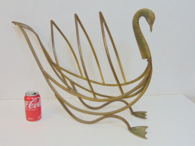 Brass swan form magazine holder, Maison Jansen style, mid-century French, 22.5" long, 7.25" wide, (1 of 5)