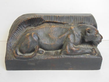 Wood carving, lion, signed Rannus, 17 3/8" long, 7" deep, height is 8.5"