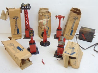 6 Marx train accessories, signal posts, transformer, light posts, spotlight, come with boxes, but