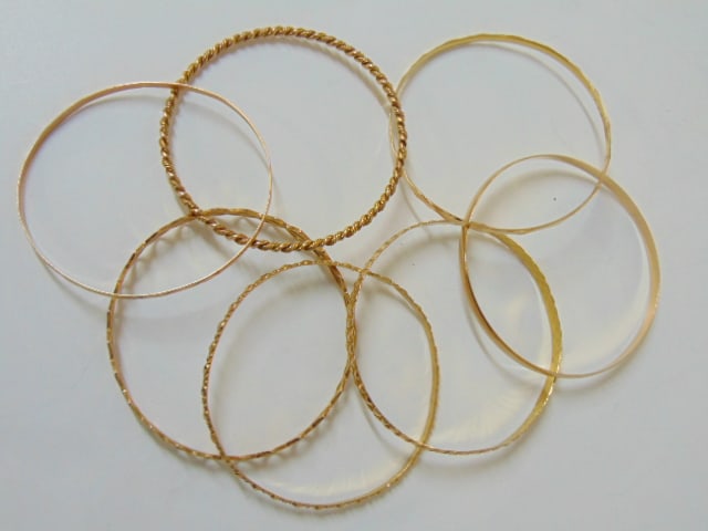 Jewelry. (7) GOLD 18kt bangles 63.65 grams total weight, plain design bangle hallmark 18kt all other (1 of 5)