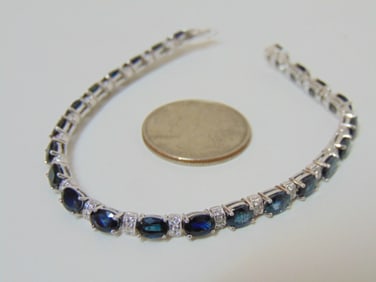 Jewelry. 14kt Diamond sapphire white gold bracelet, 13.45 grams, hallmark 585, 23 individual oval