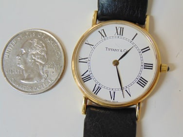 Jewelry. Gold 14kt Tiffany & Co. wristwatch, vintage, inscribed W.F.S. 25 years CHEMICAL 5-20-93,