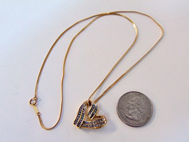 Jewelry. Gold & Diamond heart necklace, 14kt chain & 10kt pendant, chain is 2.15 grams, pendant 2.95