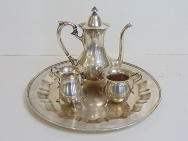 Sterling silver tea set, tea pot, sugar, creamer & serving tray, 59 troy, several feet are bent. (1 of 4)