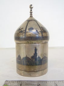 Silver canister with lid, "Baghdad 1927, with etched scenes of buildings, boats,, canister is 5.25"