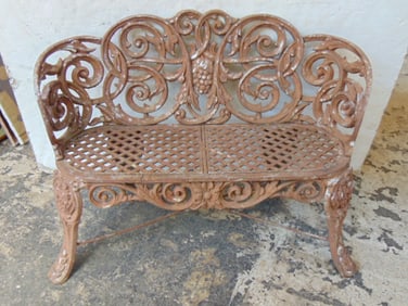 Victorian cast iron garden bench, decorative curls & cluster of grapes in center, bench is 41" wide,