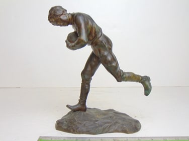 Figural bronze, football player, signed Bofill, 10" wide, 4.5" deep, height is 11"