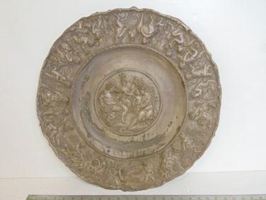 Renaissance revival style silvered bronze charger with various figures, putti, goats, diameter is