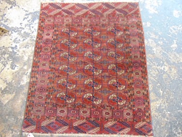 Small Persian carpet, Bokhara, in red, rug is 51" by 42"