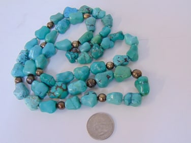 Jewelry. Turquoise chunky bead necklace, clasp marked 925, sterling beads in between the turquoise