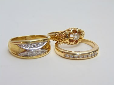 Jewelry. (3) GOLD & Diamond rings/bands to include 8 small inset diamond band hallmark 14k, 2.70