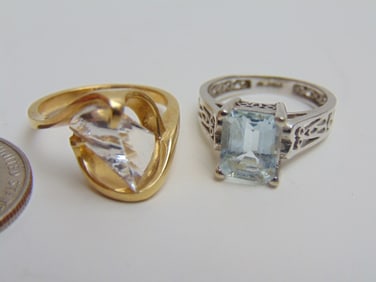 Jewelry. (2) GOLD rings to include hallmark 14k white gold filigree w/ light blue stone, 3.30 grams,