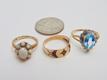 Jewelry. (3) GOLD rings, antique rose gold band hallmark 10 missing stones, 2 grams size 6 1/2; opal
