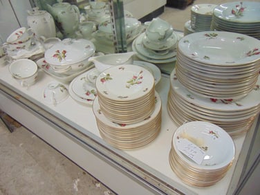 Large set of Rosenthal porcelain dinnerware, red rose decorated, includes 11 dinner plates, 12 lunch