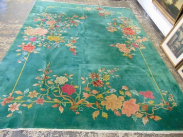 Roomsize Chinese art deco carpet in green, with floral decorations, no stains, odor, rug is 11'5" by