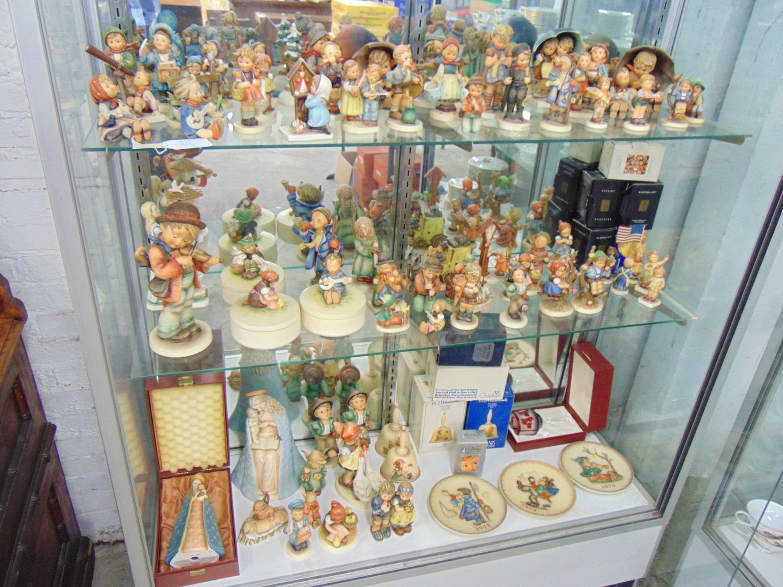 Large collection of Hummel's, figurines, lidded boxes, bells and a large selection of still boxed co (1 of 15)