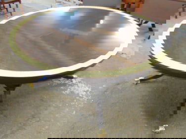 Round dining table with large leaf possibly by Baker, banded inlaid edge, brass capped feet