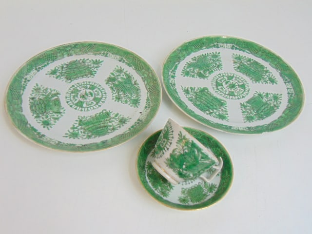 Fitzhugh porcelain cup & saucer plus two plates, in green, plates are 9 5/8" in diameter, one plate: Fitzhugh porcelain cup & saucer plus two plates, in green, plates are 9 5/8" in diameter, one plate has small chip