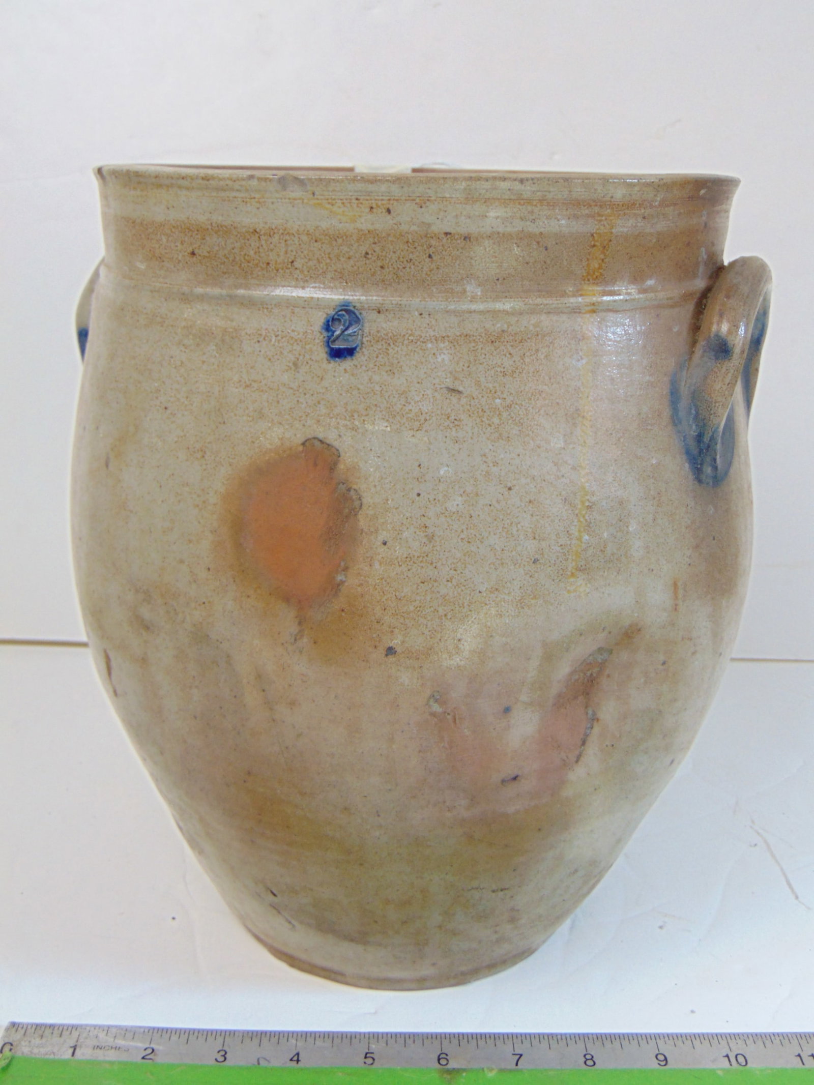Stoneware ovoid jar, #2, with blue highlights around handles, has several "dents", cracks, height is (1 of 8)