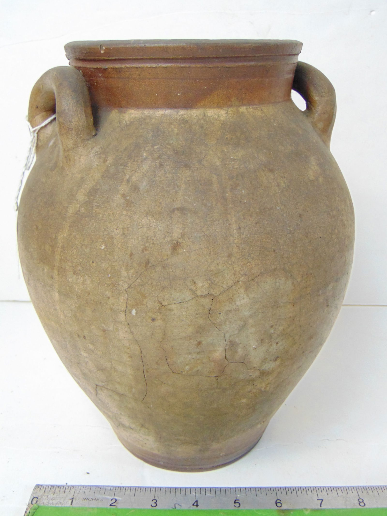 Ovoid stoneware storage jar, "Charlestown", with open loop handles, no decoration, chip on rim,: Ovoid stoneware storage jar, "Charlestown", with open loop handles, no decoration, chip on rim, various airlines glaze ?), jar is 10 3/8" tall, diameter is 8.25".
