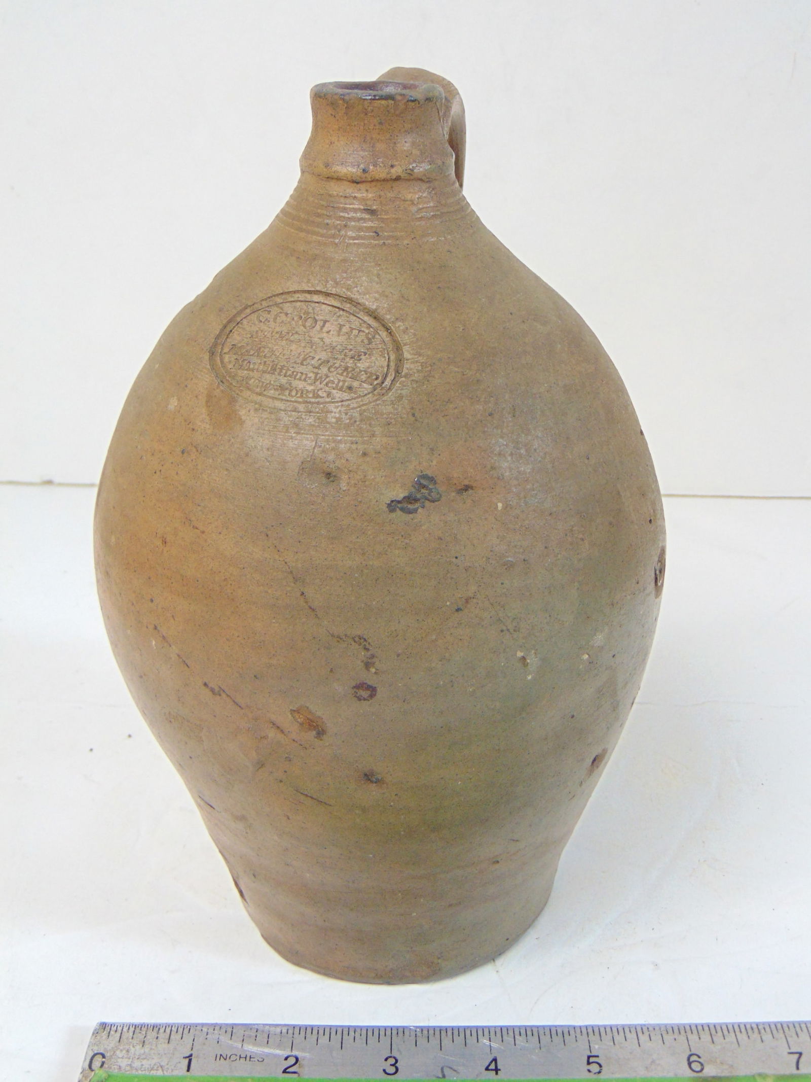 Small ovoid stoneware jug, "C. Crolius Stoneware Manufacturers, Manhattan Wells, New York", incised (1 of 7)