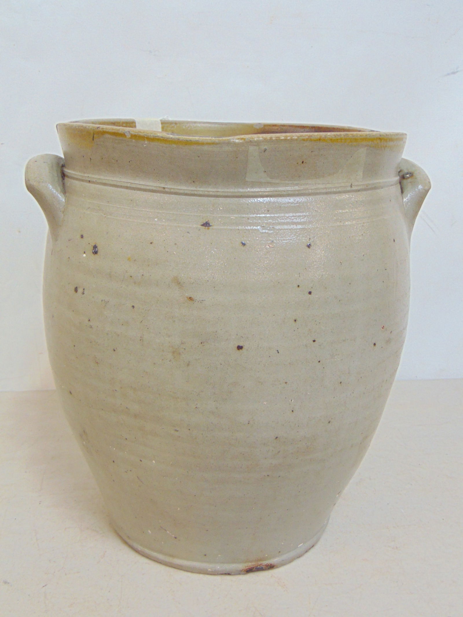 Stoneware ovoid shaped jar with handles, no decoration, jar is 12" tall, 10.5" wide.: Stoneware ovoid shaped jar with handles, no decoration, jar is 12" tall, 10.5" wide.