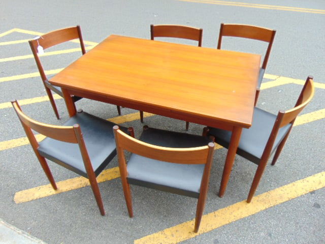 Danish modern table with 6 chairs by Frem Rojle, teak table with pull out leaves is 48" by 31.5", (1 of 5)