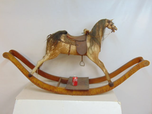 Antique rocking horse, carved wood covered in hide, paint decorated  73" long (rockers), depth is (1 of 8)