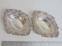 Pair silver hallmarked reticulated nut dishes, 7.5 troy, 7.75" by 6"