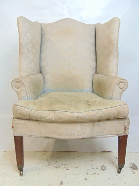 Wingback armchair, upholstered, needs restoration (upholstery stained, old), 31" wide, 28" deep,: Wingback armchair, upholstered, needs restoration (upholstery stained, old), 31" wide, 28" deep, height is 44.5" tall.