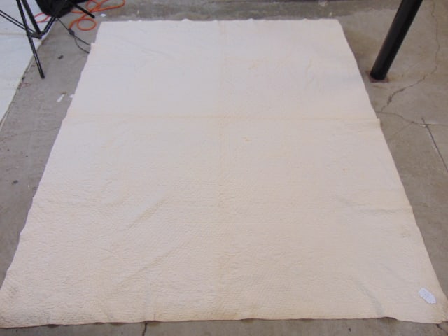 White tufted quilt, few minor stains, quilt is 88" by 74" (1 of 4)