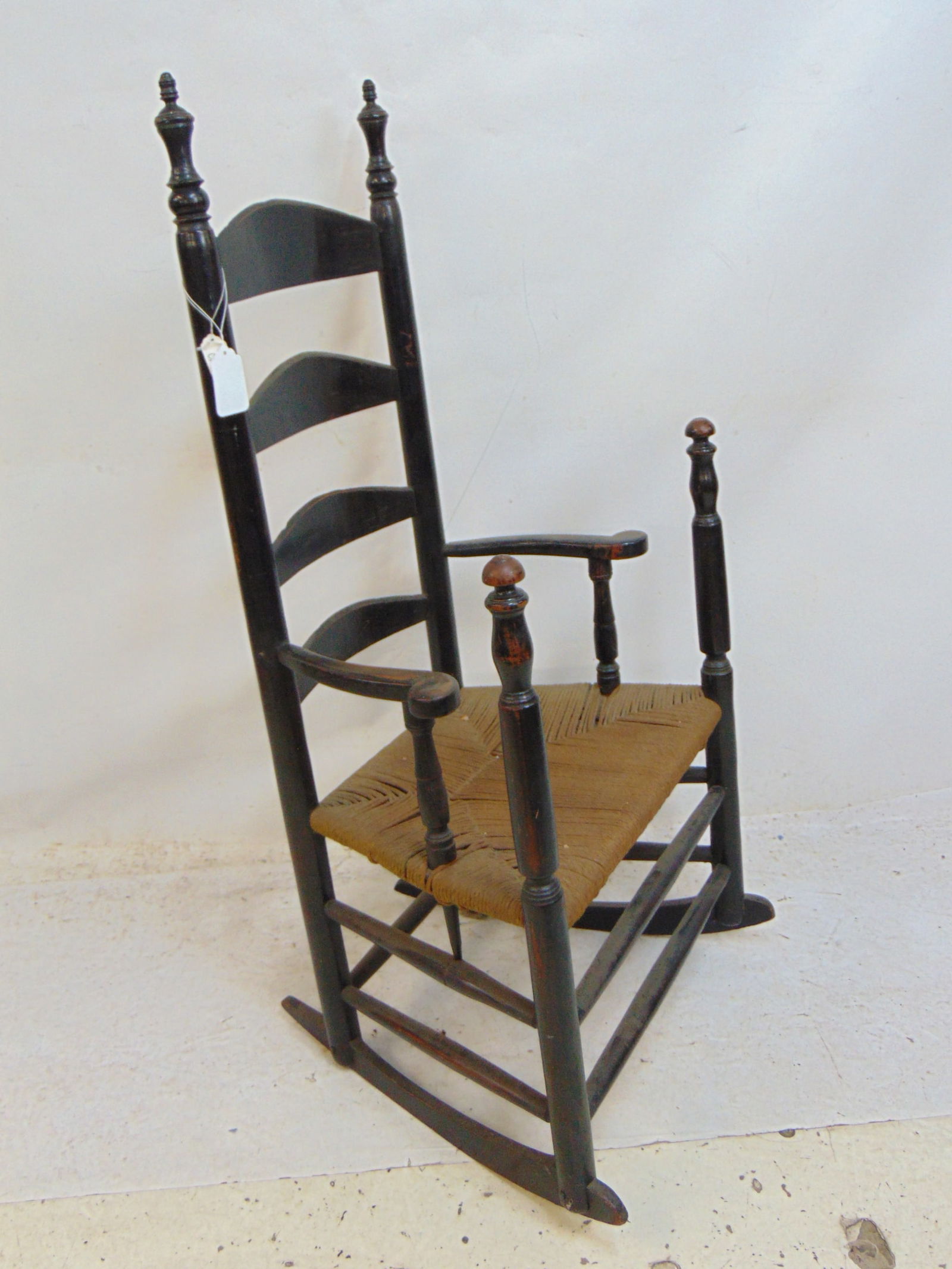 Rare ladder back rocking chair with extended vertical assist supports, in old black paint, rush (1 of 6)