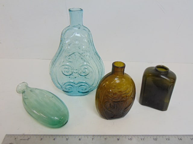 4 early glass bottles, flask, scroll flask & other, in light blue, brown & olive green, scroll flask (1 of 10)