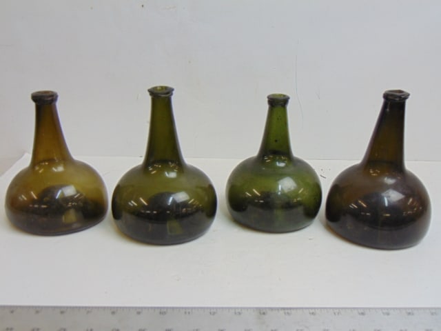 4 antique green "Onion" bottles, 7.5" tall, height varies slightly, one has small chip on rim (1 of 4)