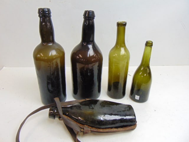 5 early bottles, olive green glass, various sizes, shapes, one in partial leather pouch, smallest (1 of 8)